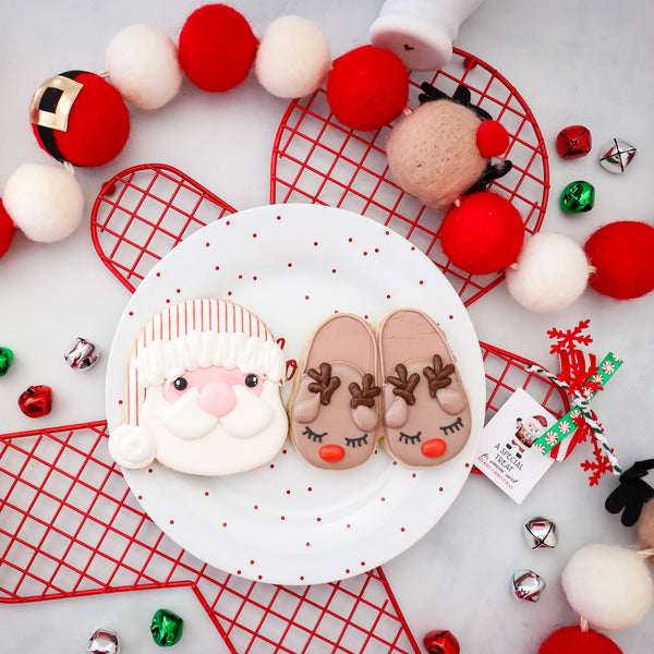 Santa in PJs and Rudolph Slippers